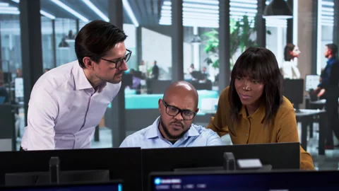 Financial Analysts Using Technology To Predict Market Trends Stock Footage 329679190