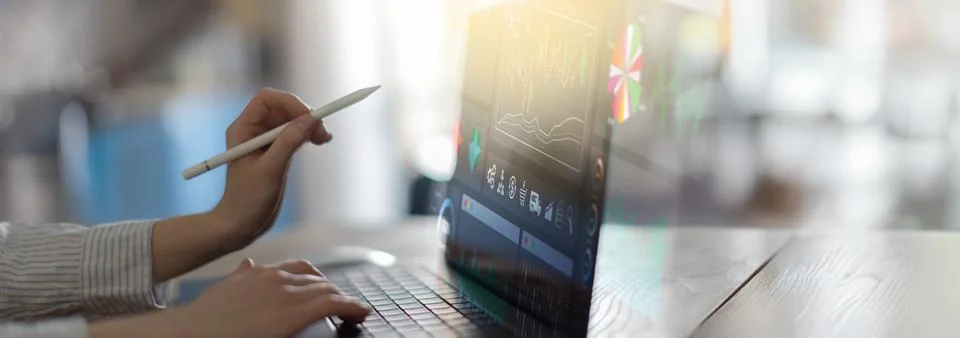Financial Analytics and Data Visualization Displayed on a Digital Tablet in a Stock Photos