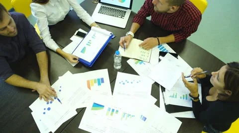 Financial and business documents on the table and human hands Stock Footage 67970563