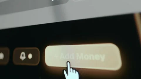Financial app with button labeled Add Money Stock Footage 331148558