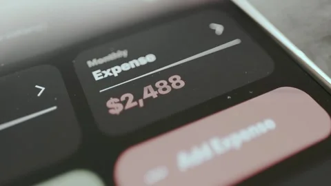 Financial application tracking monthly expenses, Monthly Expense total of 2488 Stock-Footage 330670581