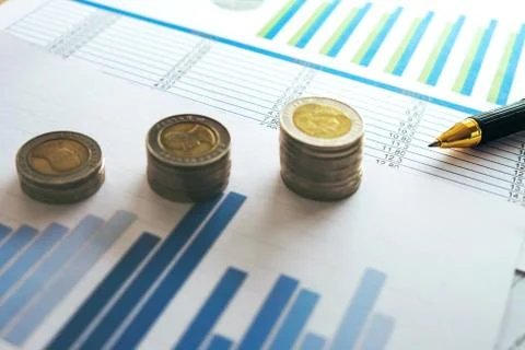 Financial banking stock spreadsheet with stack coin and pen, accountant data, Foto stock