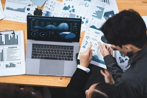 Financial dashboard data display on laptop screen. Concord Stock Photos