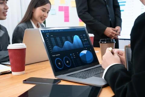 Financial dashboard data display on laptop screen. Concord Stock Photos
