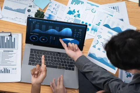 Financial dashboard data display on laptop screen. Concord Stock Photos