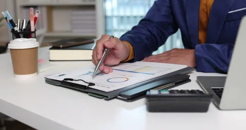 Financial data analysis and business performance evaluation help professionals Stock Footage 347356512