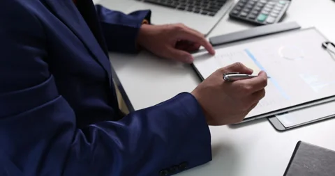 Financial data analysis and business performance evaluation help professionals Stock Footage 347356777