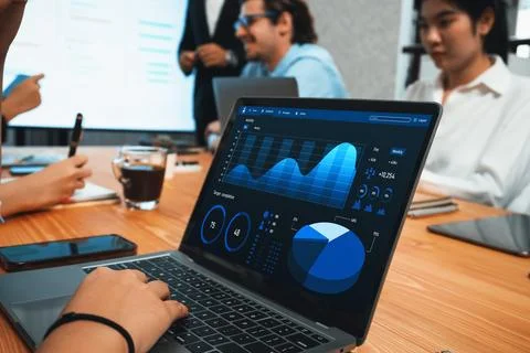 Financial data analysis dashboard display on laptop screen. Habiliment Stock Photos