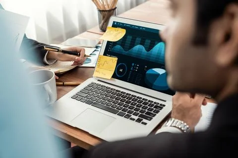Financial data analysis dashboard display on laptop screen. Meticulous Stock Photos