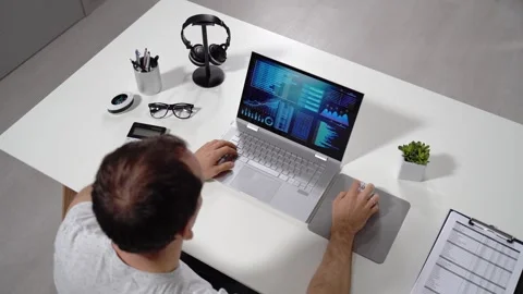 Financial Data Analyst Male Using KPI Dashboard Stock Footage 254848976