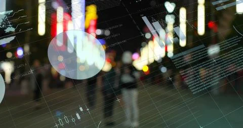 Financial data and charts image over blurred city lights background Stock Photos