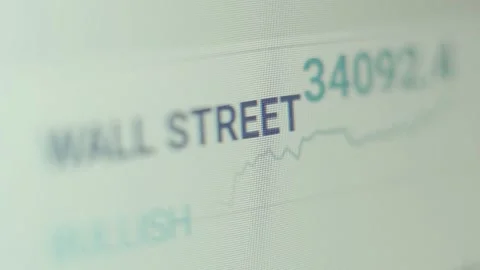 Financial data in the form of digital prices on a laptop monitor display. Wall Stock Footage 152534136