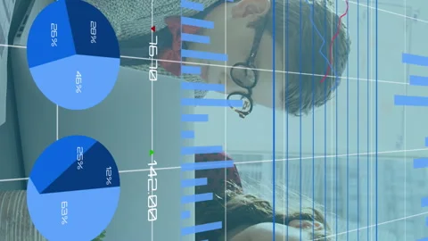 Financial data over young people working on digital advice. Stock Footage 312421636