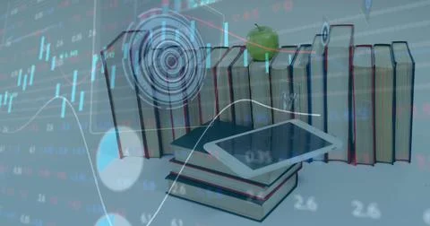 Financial data processing against digital tablet on stack of books on white Stockfoto's