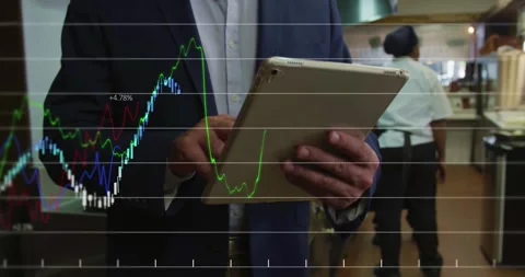 Financial data processing against mid section of man using digital tablet at a Stock Footage 330246041