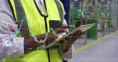 Financial data processing against mid section of engineer using digital tablet Stock Photos