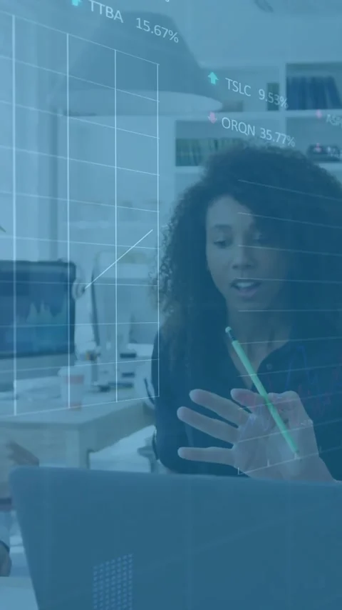 Financial data processing animation over diverse business team collaborating in Stock Footage 343645591
