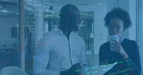 Financial data processing image over business people discussing documents in Stock Photos