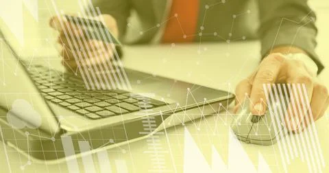 Financial data processing over man holding credit card and using laptop 스톡 사진