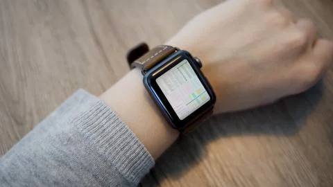 Financial Data on Smart Watch Screen Stock Photos