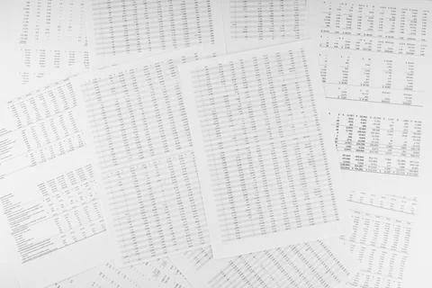 Financial documents lying on the table. Close-up view. Stock Photos