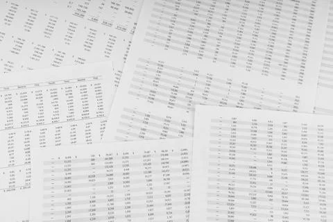 Financial documents lying on the table. Close-up view. Stock Photos