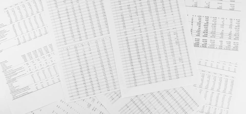 Financial documents lying on the table. Close-up view. Stock Photos