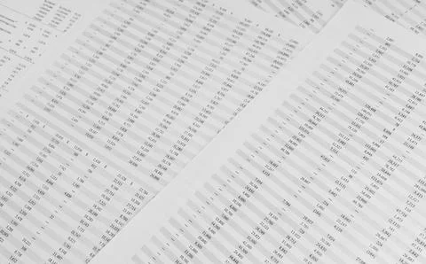 Financial documents lying on the table. Close-up view. Stock Photos