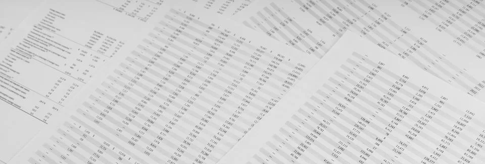 Financial documents lying on the table. Close-up view. Stock Photos