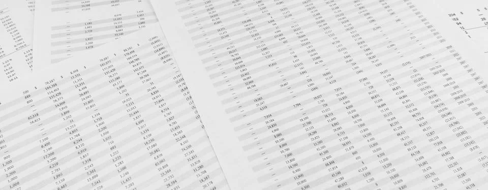 Financial documents lying on the table. Close-up view. Stock Photos