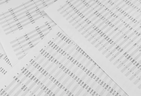 Financial documents lying on the table. Close-up view. Stock Photos