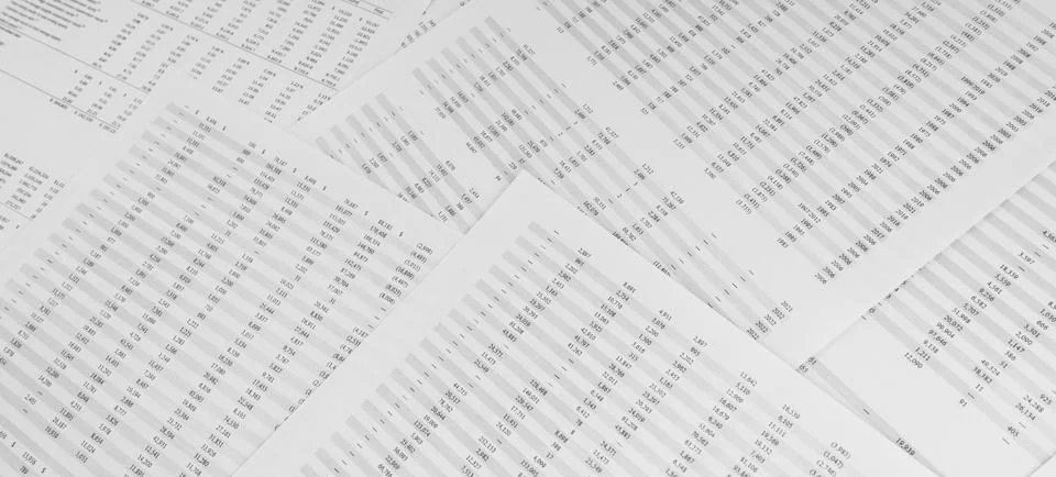 Financial documents lying on the table. Close-up view. Stock Photos