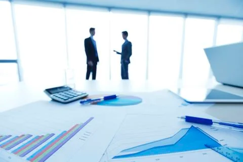 Financial documents on table Stock Photos