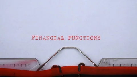 Financial functions - phrase printed on an old typewriter in red letters Stock Footage 129535653