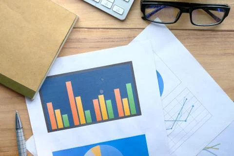Financial graphs on office table, using self created chart Stock Photos