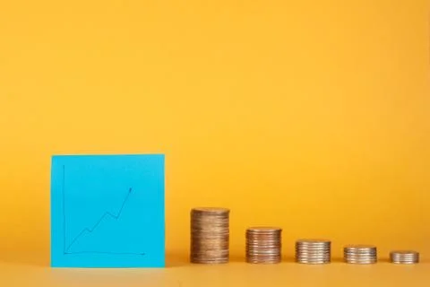 Financial heyday. stack of coins with a graph for increasing Stock Illustration
