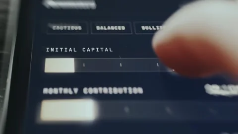Financial interface showing slider control for modifying initial capital Stock Footage 335493918