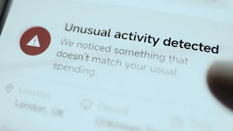 Financial interface warns that unusual activity was detected because Stock Photos