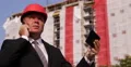 Financial Investor Inspect Construction Stage Steps Talking Phone Using Tablet 4k or 4k+ Resolution