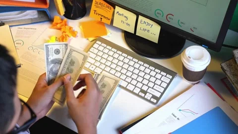Financial Management at Work Counting Money Amid Office Productivity Stock Footage 306391402