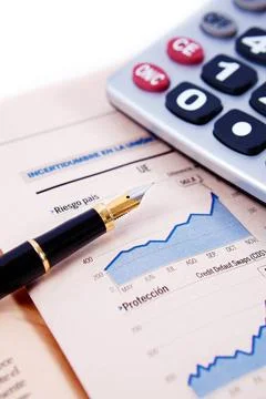 Financial objets background Close up image of graphs and statistics with p... Stock Photos