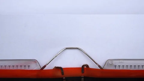 Financial plan - phrase printed on an old typewriter in red letters, close up. Stockbeeldmateriaal 126645016