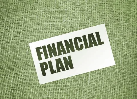 Financial plan words on card on burlap canvas. Business debts concept Stockfoto's