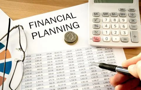 Financial Planning and coins Stock Photos