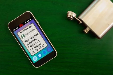 Financial problems concept. Bank notification message on smartphone screen an Stock-Fotos