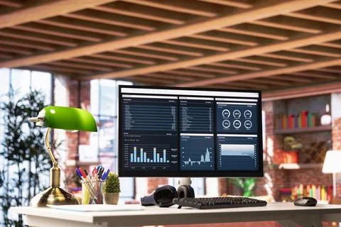 Financial program user interface on PC screen on home office desk Stock Photos