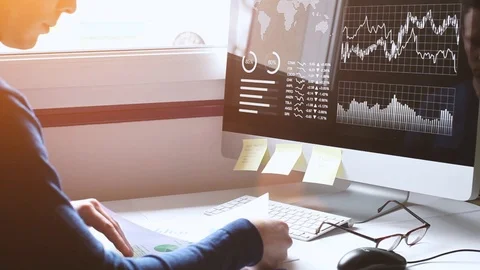 Financial report analytics, business man studying charts and graphs Stock Footage 89929256
