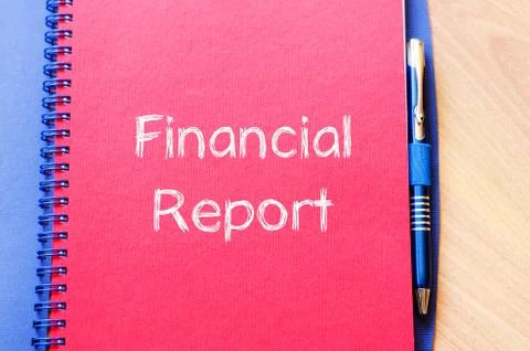Financial report text concept on notebook Stock Photos