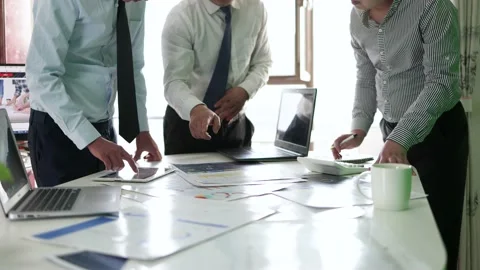 The financial research team meets to formulate investment strategy plans Stock Footage 193995185