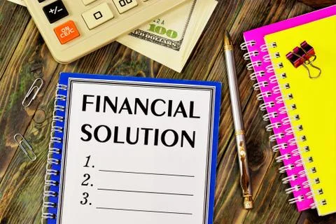 The financial solution is a text label in a folder. Stock Photos
